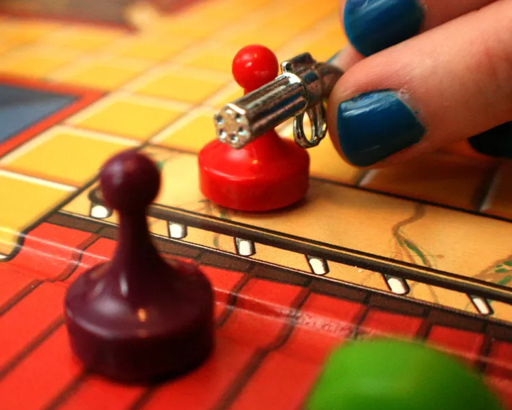 Colonel Mustard in the games room with a meeple